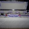 Centre de table, table d'honneur, en fleurs origami (poinsettias, roses et lys)